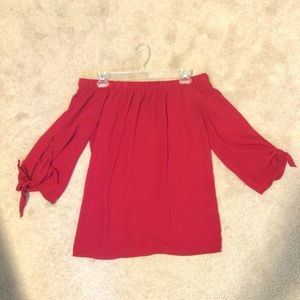 Red off the shoulder shirt